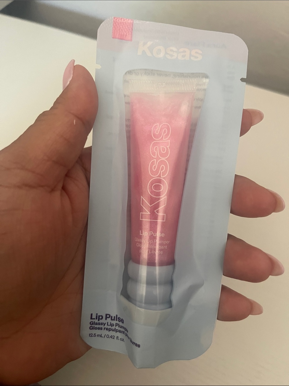 Kosas Lip Pulse Glossy Lip Plumper — Shimmering Baby Pink
